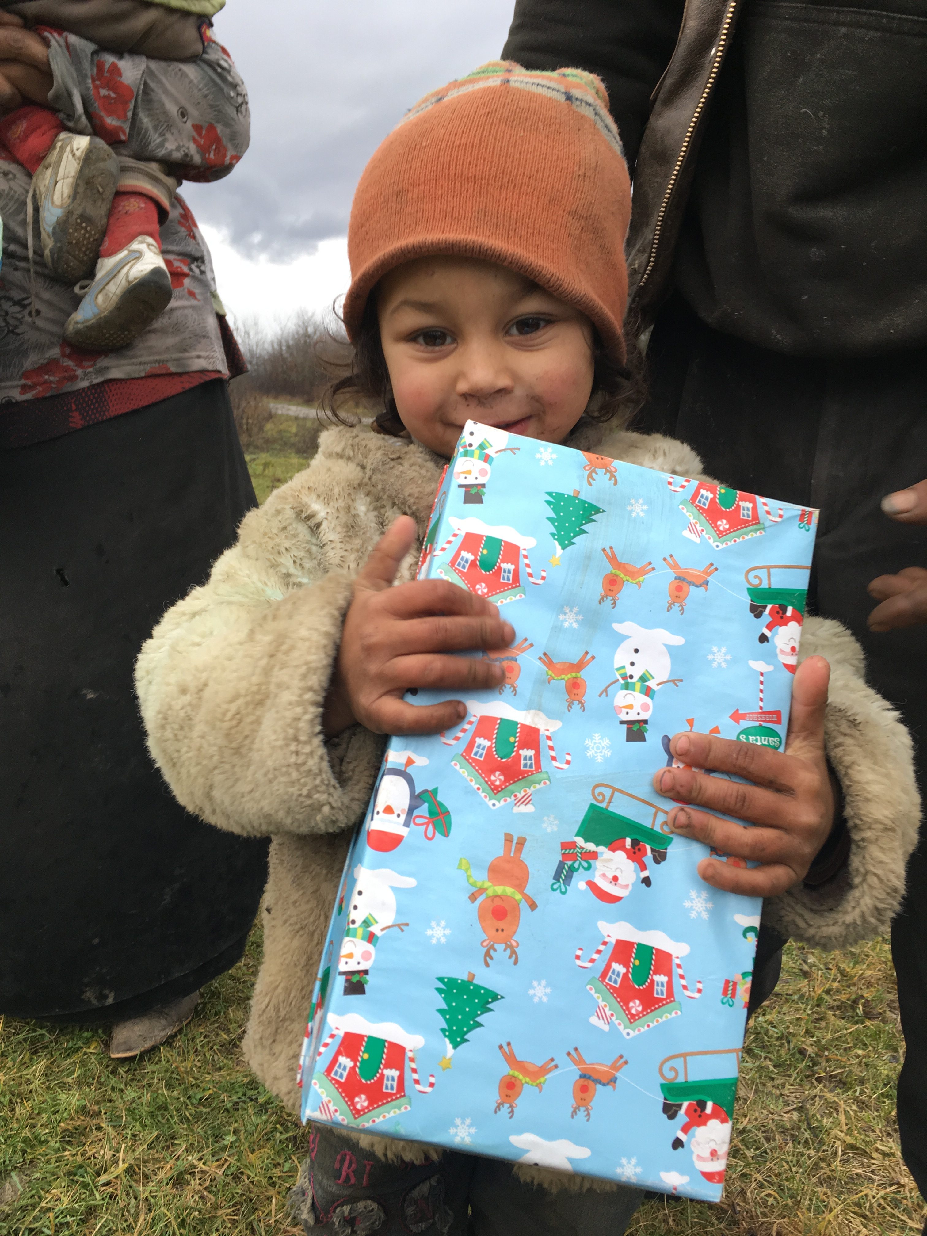 Agency Express Christmas shoebox appeal - Young boy with gift